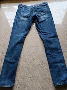 Ripped Blue Denim Jeans