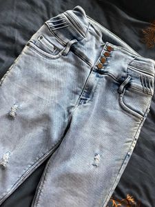 Ripped Light Wash Denim Jeans