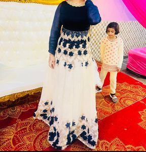 Ethnic Gown With Flairs And Butterfly Flowers