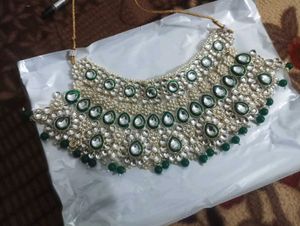 bridal jewellery set in green trending jeweller