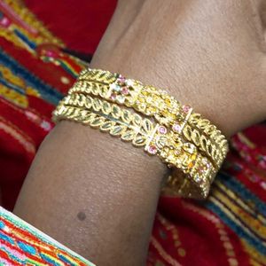 Set of Three Gold Tone Bangles