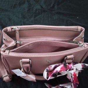 Chic Pink Handbag with Floral Scarf