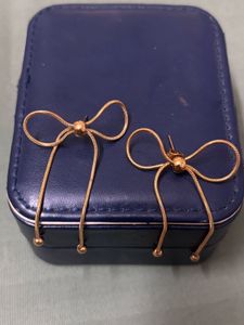 Golden Whisper – Elegant Bow Drop Earrings