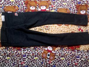 These Is A Black Colour Jeans For Boys.