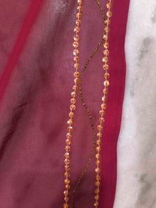 Vintage Orange saree with maroon background