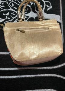 Elegant Gold-Tone Handbag