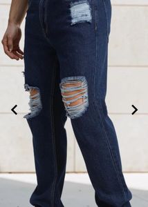 street full length heavy distressed straight jeans