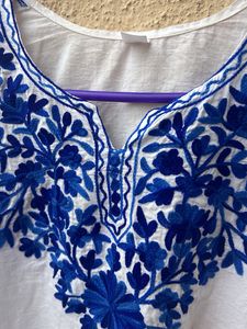 Short Kurti With Blue Work On It