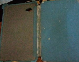 Samsung Galaxy Tablet With Blue Cover And Charger