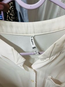 Sleeveless Button-Up Blouse