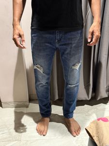 Ripped Blue Denim Jeans