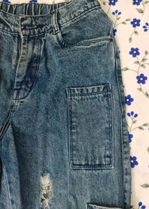 dark blue ripped jeans