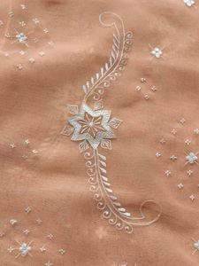 Women Peach Embroidered Georgette Saree