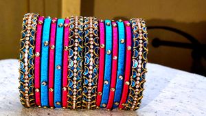 Plue With Pink Slik Thread Bangles