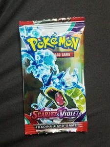 Sealed Packs Of Pokemon Cards.