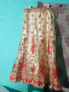 Beautiful golden and pink colour lahenga