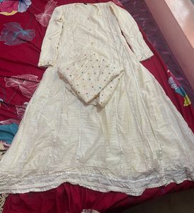 Elegant Cream Embroidered Anarkali Suit