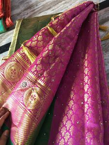 Pink And Parrot Green Pattu Saree.