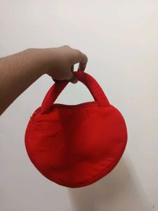 cute red soft fur hand bag.