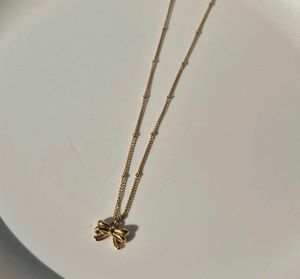 Gold Bow Necklace