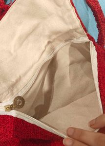 Red Fringe Crossbody Bag from Pushkar