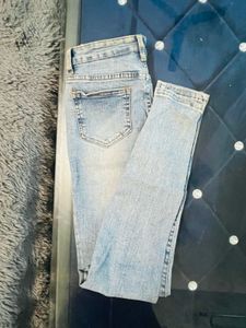 Distressed Denim Jeans