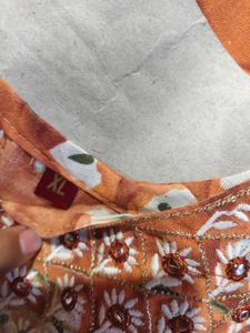 🆕 Naira Cut Orange Embroidered Kurti