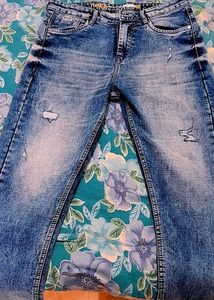 Distressed Denim Jeans