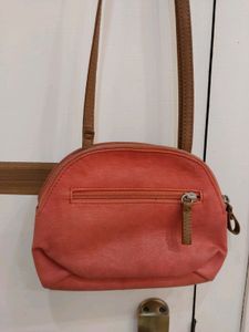 Baggit Leather sling Bag Coral Color With 2 Compar