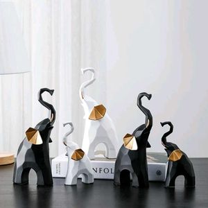 Elephant Charm Statues in Varying Sizes