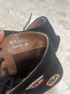 Black patch army boots