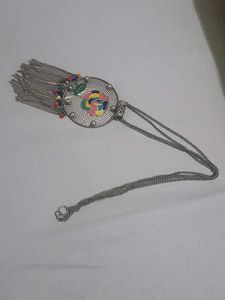 Multiple Pairs Of Earings And One Necklace