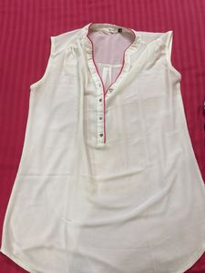 White Sleeveless Top