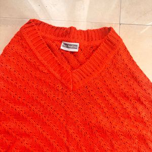 Cozy Orange Knit Poncho with Fringe