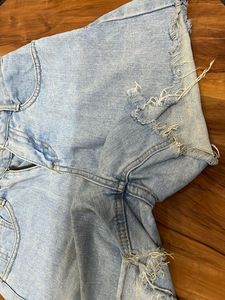 denim with little stains, which are removeable
