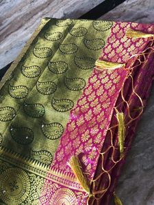 Pink And Parrot Green Pattu Saree.