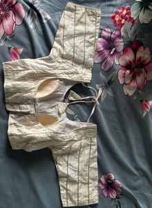 White with golden stripes detailing