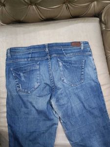Distressed Denim Jeans