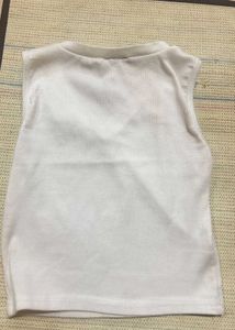 A White V Neck Top.