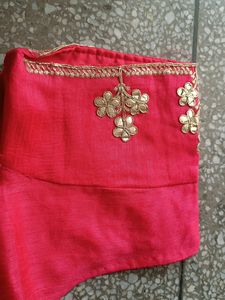 Beautiful Carrot Colour Blouse With Back Design