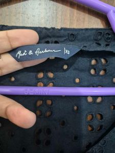 Black Eyelet Peplum Top