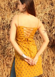 nishorama mustard noodle strap corset kurti
