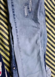 Distressed Light Wash Denim Jeans