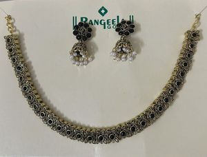 Black With Gold Neck Piece And Matching Jhumka