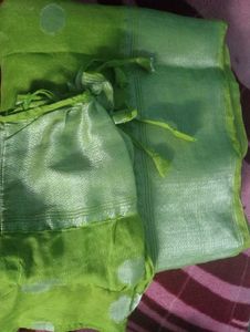 Parrot Green Saree With Readymade Blouse.