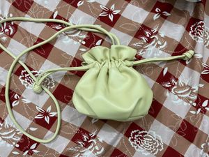 Off White Solid Potli Clutch