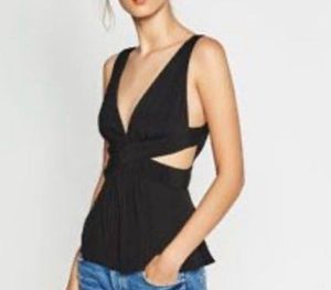 Zara cut out top *rare find*      ₹ 750