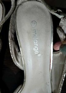 New sparkly gold stilettos.