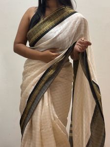Elegant White Gold Black Saree