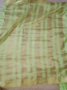 Silk Saree with Readymade Blouse.